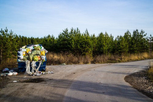 Builders managing waste on a construction site